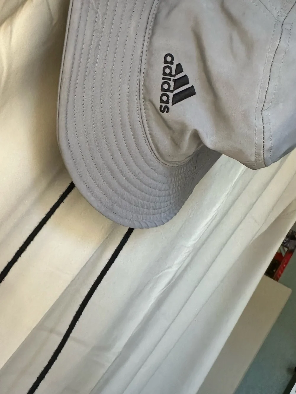 adidas Victory Bucket Hat in grey.